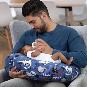 Boppy Nursing Pillow Original Support, Blue Dinosaurs, Ergonomic Nursing Essentials for Bottle and Breastfeeding, Firm Fiber Fill, with Removable Nursing Pillow Cover, Machine Washable