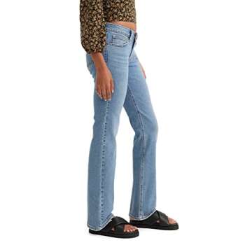 Levi's Women's Superlow Boot Jeans – Trendy Low Rise Fit in Medium Indigo Destructed