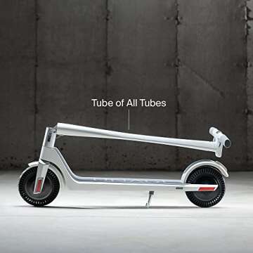 UNAGI Model One E500 - Dual Motor Folding Electric Scooter - 15 mph - 28.5 lbs - Sea Salt White