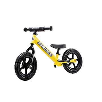 Strider 12" Sport Bike, Yellow - No Pedal Balance Bicycle for Kids 1 to 4 Years - Includes Safety Pad, Padded Seat, Mini Grips & Flat-Free Tires - Tool-Free Assembly & Adjustments