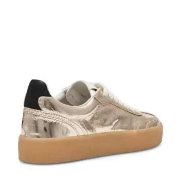 Steve Madden Women's Gold Tux Sneaker for Effortless Style
