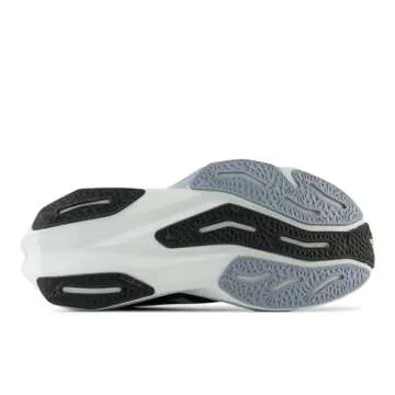 New Balance Men's FuelCell Rebel V4 Running Shoe, Graphite/Black/Quartz Grey, 10.5