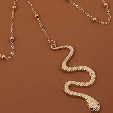 Zeshimb Boho Snake Thigh Chain Gold Serpent Leg Chain Snake Pendant Leg Chain Animals Statement Thigh Chain Festival Summer Beach Body Chain Jewelry for Women