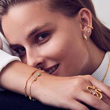 MEVECCO Dainty Gold Snake Huggie Hoop Earrings for Women 18K Gold Plated Green Eyes Snake Earrings Snake Hoop Earrings Minimalist Dangling Snake Earrings