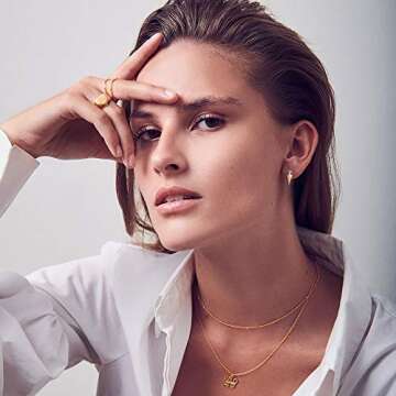 MEVECCO Dainty Gold Snake Huggie Hoop Earrings for Women 18K Gold Plated Green Eyes Snake Earrings Snake Hoop Earrings Minimalist Dangling Snake Earrings