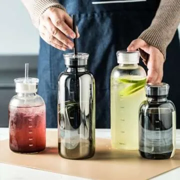 DNIENKGE Glass water bottle With Time Marker -24oz with 2 caps and straw,Reusable Glass Drinking Bottles，Suitable For Drinks, Juices, Sodas, Coke, As Gifts Etc (24oz)