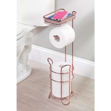 mDesign Steel Metal Free Standing Toilet Paper Holder Stand and Dispenser with Storage Shelf - Toilet Tissue for Bathrooms, Washroom - Holds 2 Extra Mega Rolls - Concerto Collection - Rose Gold