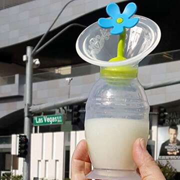haakaa Manual Breast Pump Hand Pump Milk Pump Breast Milk Collector with Suction Base and Flower Stopper 100% Food Grade Silicone BPA Free (4oz/100ml) (Blue)
