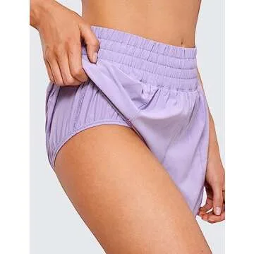 CRZ YOGA Womens High Waisted Running Shorts 4'' - Mesh Liner Lightweight Gym Sport Athletic Workout Shorts with Zipper Pocket Lilac Small