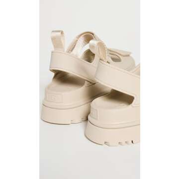 UGG Women's GOLDENGLOW Flat Sandal, SEA Salt, 8