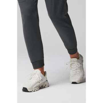 Fabletics Women's High Rise Active Scrub Jogger - MotionTech, 4-Way Stretch, Pocket-Packed, Lightweight, Semi-Slim Fit, L/Tall 31 in | 31, Onyx