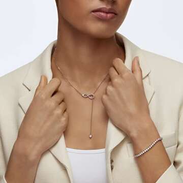 Swarovski Tennis Deluxe Collection Women's Tennis Bracelet, Sparkling White Crystals with Rose-Gold ...