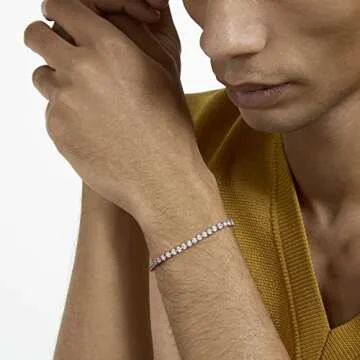 Swarovski Tennis Deluxe Collection Women's Tennis Bracelet, Sparkling White Crystals with Rose-Gold Tone Plated Band