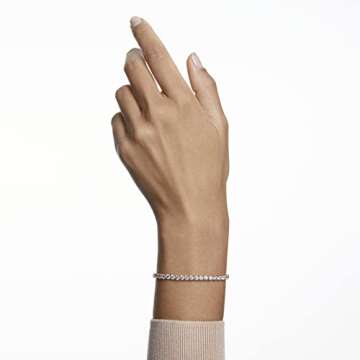 Swarovski Tennis Deluxe Collection Women's Tennis Bracelet, Sparkling White Crystals with Rose-Gold Tone Plated Band