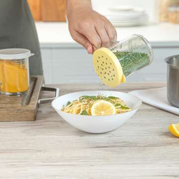 Restaurantware RW Base 10 Ounce Clear Plastic Dredge Spice Shaker 1 Reusable Dry Rub Shaker - Includes Yellow Perforated Lid With Handle Clear Polycarbonate Spice Shaker For Coarse Seasonings