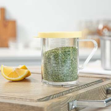 Restaurantware RW Base 10 Ounce Clear Plastic Dredge Spice Shaker 1 Reusable Dry Rub Shaker - Includes Yellow Perforated Lid With Handle Clear Polycarbonate Spice Shaker For Coarse Seasonings