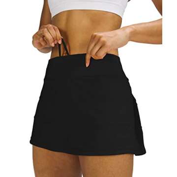 MEIVSO Women's Pleated Workout Tennis Skirts with Pockets Activewear Sports Skort Built-in Shorts