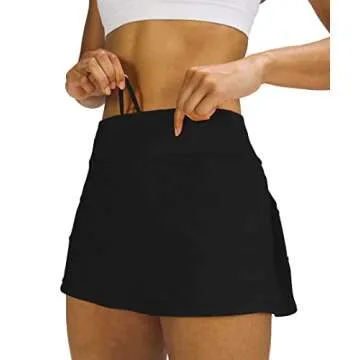 MEIVSO Women's Pleated Workout Tennis Skirts with Pockets Activewear Sports Skort Built-in Shorts