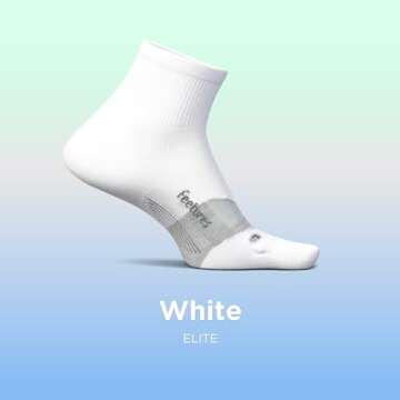 Feetures Elite Ultra Light Cushion Quarter Solid - Sport Sock with Targeted Compression - New White, M (1 Pair)