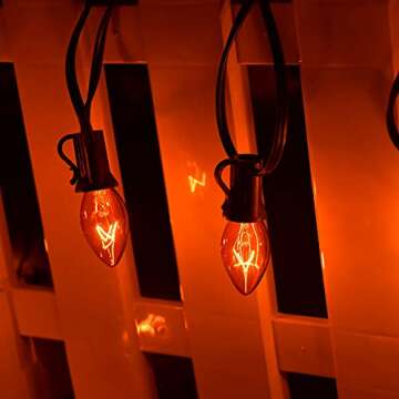 SUNSGNE C7 Orange Halloween Lights, 25Ft Outdoor Orange String Lights with 27 Clear Orange Bulbs(2 Spare), Vintage Christmas Lights for Patio, Cafe, Party, Holiday, Christmas Decor- Black Wire