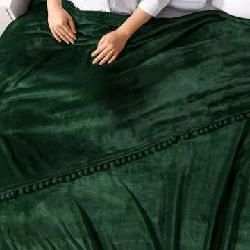 PAVILIA Fleece Throw Blanket for Couch with Pom Pom Fringe, Emerald Green, Soft Cozy Fuzzy Flannel Blanket for Sofa Bed, Lightweight Plush All Season Throw, 50x60 Inches