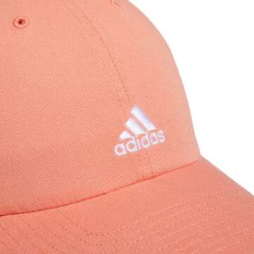 adidas Women's Saturday Hat, Relaxed fit Athletic Adjustable Cotton Baseball Cap, Semi Coral Fusion Pink/White/2.0, One Size
