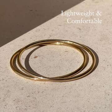 JENNY BIRD Dane Bangle | High Polish Gold, Tension Closure | Sleek, Chunky Designer Jewelry for Women