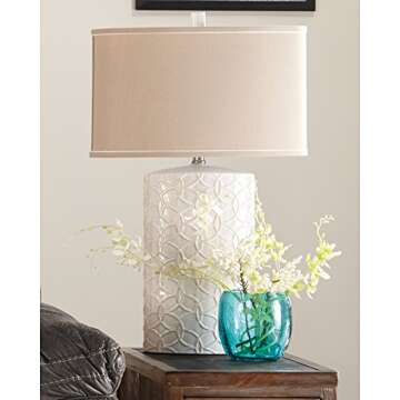 Signature Design by Ashley - Shelvia Textured Ceramic Table Lamp - Oval Drum Shade - Antique White