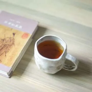 Handcrafted Wabi Sabi Coffee Mug with Rustic Charm