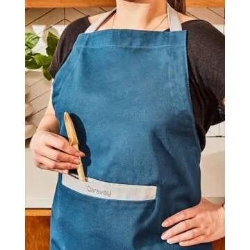 Caraway Apron - 100% Organic Cotton Apron - Features 2 Pockets & Adjustable Neck Strap - Absorbs Liquids & Dissipates Heat With Ease - Machine Washable - One Size - Cream
