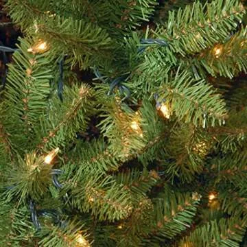 National Tree Company Artificial Pre-Lit Slim Christmas Tree, Green, Kingswood Fir, White Lights, Includes Stand, 7 Feet
