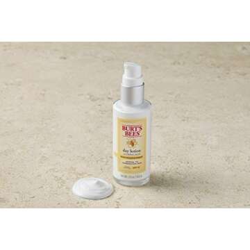 Burt's Bees Skin Nourishment Day Lotion with SPF 15 for Normal to Combination Skin, 2 Oz (Package May Vary)