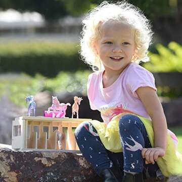 Breyer Horses Unicorn Magic Wooden Stable Playset with 6 Unicorns | 6 Piece | 6 Stablemates Unicorns Included | 6” H x 9” L x 2.5” D | 1:32 Scale | Model #59218, Multicolor