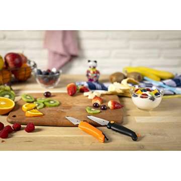 Kuhn Rikon Kinderkitchen Dog Knife Straight Blade, sharp enough to cut food but not small fingers, Orange