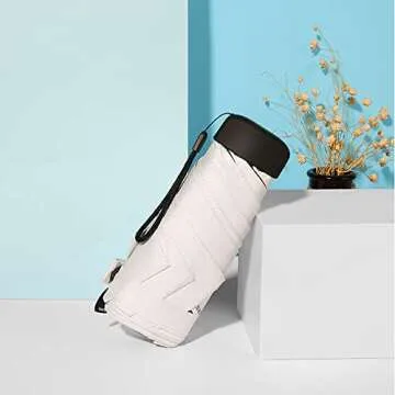 AFULILI Mini Travel Umbrella with UV Protection and Style