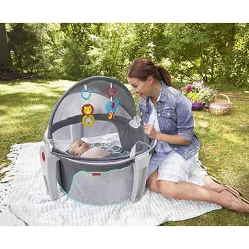 Fisher-Price Portable Bassinet On-The-Go Baby Dome, Travel Play Space with Developmental Newborn Toy...