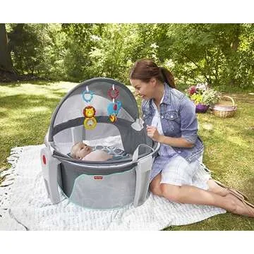 Fisher-Price Portable Bassinet On-The-Go Baby Dome, Travel Play Space with Developmental Newborn Toy...