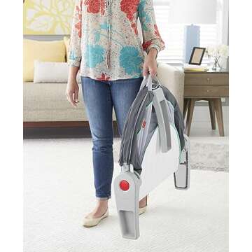 Fisher-Price Portable Bassinet On-The-Go Baby Dome, Travel Play Space with Developmental Newborn Toys & Canopy, Grey Bubbles