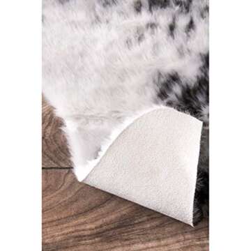 nuLOOM Halina Faux Cowhide Area Rug, 5' 9" x 7' 7", Black