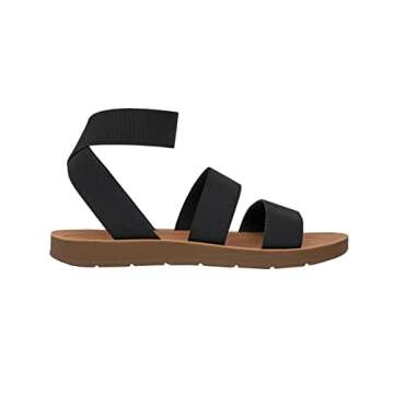 CCUSHIONAIRE Indego Stretch Sandal – Lightweight Slip-On with Memory Foam & Soft Straps for All-Day Support | Casual or Dressy Summer Sandals for Women 2025, BLACK 9.5