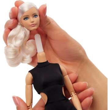 Barbie Basics Model 02 Collector Doll with Blonde Hair, Black Mini Dress & Gladiator Boots, Universal-fit Fashions, Posable Body & Swappable Doll Head