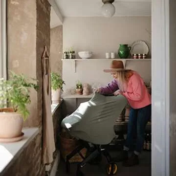 mushie Baby Car Seat Canopy Cover | Breathable & Stretchy Multi Use Cover for Breastfeeding, Nursing, High Chair, Shopping Cart, Strollers (Dried Thyme)