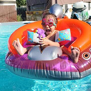SWIMLINE ORIGINAL Inflatable UFO Spaceship Pool Float Ride On With Fun Constant Flow Laser Ray Gun Water Squirter For Kids | Cool Retro Style | For Beach Ocean Pool Lake | Extra Thick Large Floatie