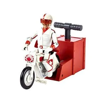 Disney Pixar Toy Story 4 Stunt Racer Duke Caboom Figure, 5.9 in, in Racing Outfit with Motorcycle and Launcher, Race Up to 15 ft and Perform Stunts, Gift for 3 Years and Older