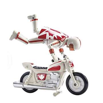 Disney Pixar Toy Story 4 Stunt Racer Duke Caboom Figure, 5.9 in, in Racing Outfit with Motorcycle and Launcher, Race Up to 15 ft and Perform Stunts, Gift for 3 Years and Older