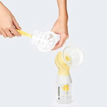 Medela, Swing, Single Electric Breast Pump, Compact and Lightweight Motor, 2-Phase Expression Technology, Convenient AC Adaptor or Battery Power, Single Pumping Kit, Easy to Use Vacuum Control