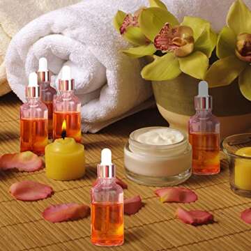 Nuogo 100 Pcs Glass Dropper Bottles with Golden Caps