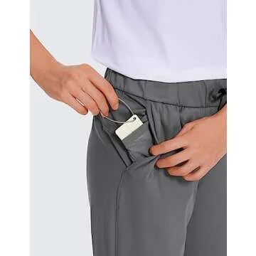 CRZ YOGA Womens 4-Way Stretch Ankle Golf Pants 7/8 Casual Dress Work Athletic Travel Workout Sweatpants with Pockets Dark Carbon X-Small