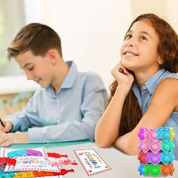 AYGXU 30pcs Valentines Day Gifts for Kids .Valentines Day Cards for Kids classroom School .Heart POP Bracelets.Valentine's Classroom Exchange Cards and Kids Party Favors.Valentines goody bag filler.