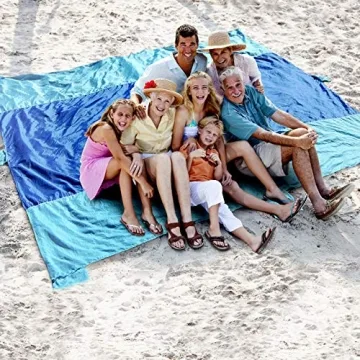 10' X 9' - Our Sandless Beach Mat is Oversized and is a Great Blanket Under Your Beach Chairs - Compact and Lightweight - 6 Sand Anchor Pockets and Metal Stakes Plus Zippered Valuables Pocket